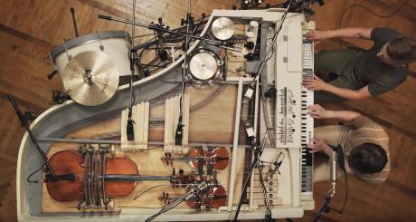 A Broken Vintage Piano Turned Into a Unique Analog Hybrid of 20 Instruments Connected to the Piano Keys